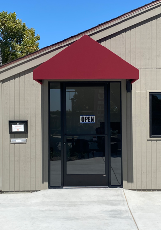 Showcases 6 Entrance Canopy and Novo Lux Roller Shades at the Park Place Apartments in Ventura | Ventura, CA | Van Nuys Awning | Ventura
