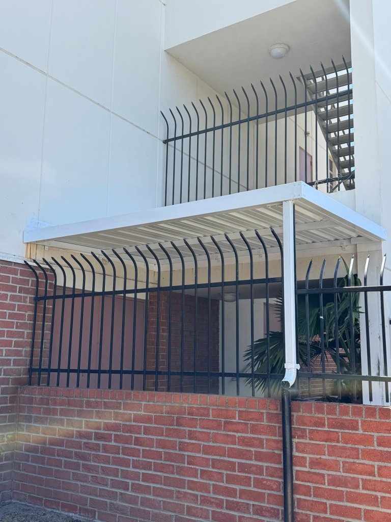 Showcases 8 One PBR Sheetmetal Flat Canopy | Los Angeles, CA | Van Nuys Awning | Los Angeles